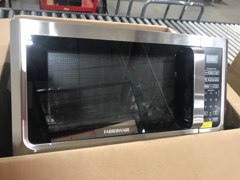 Photo 1 of 1.3 cu. ft. Countertop Microwave Oven with LED Light/SENSOR 1100-Watt in Stainless
