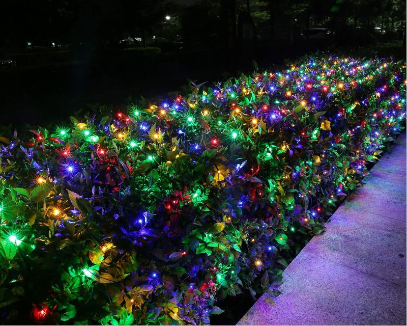 Photo 1 of ** FOR PARTS**BlcTec Christmas Net Lights, 360 LEDs 9.8ft x 6.6ft Multicolor Outdoor Christmas Decorations Lights with 8 Modes, Timer, Connectable, Waterproof Durable Green Weir for Bushes, Trees, Yard Xmas Décor Muticolor 360LED