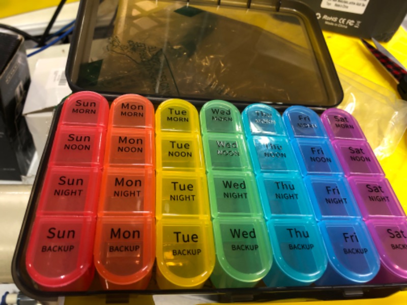 Photo 2 of **FOR PARTS** Weekly Pill Organizer 4 Times a Day, Daily Pill Box 7 Day, Large Travel Pill Case with 28 Compartment to Hold Medicine, Vitamin and Supplement (Color) Black - Rainbow