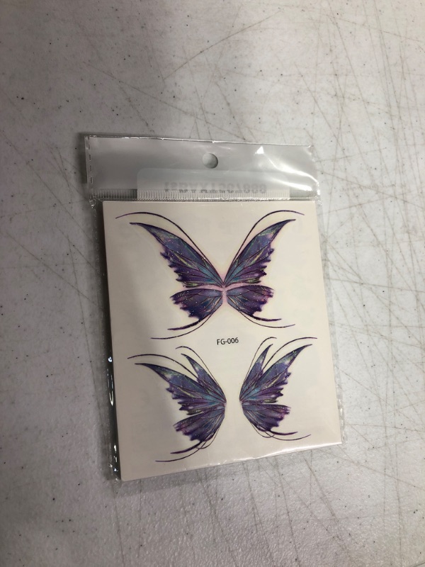 Photo 2 of 14 Sheets Glitter Butterfly Temporary Tattoos Sticker for Women Girls Eye Face Makeup Decoration, Flash Fairy Wings Body Art Shiny Butterflies Waterproof Fake Tattoos for Festival Party Eye Decor Type1-Buterrfly