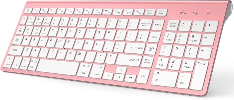 Photo 1 of wired keyboard pink with white keys 