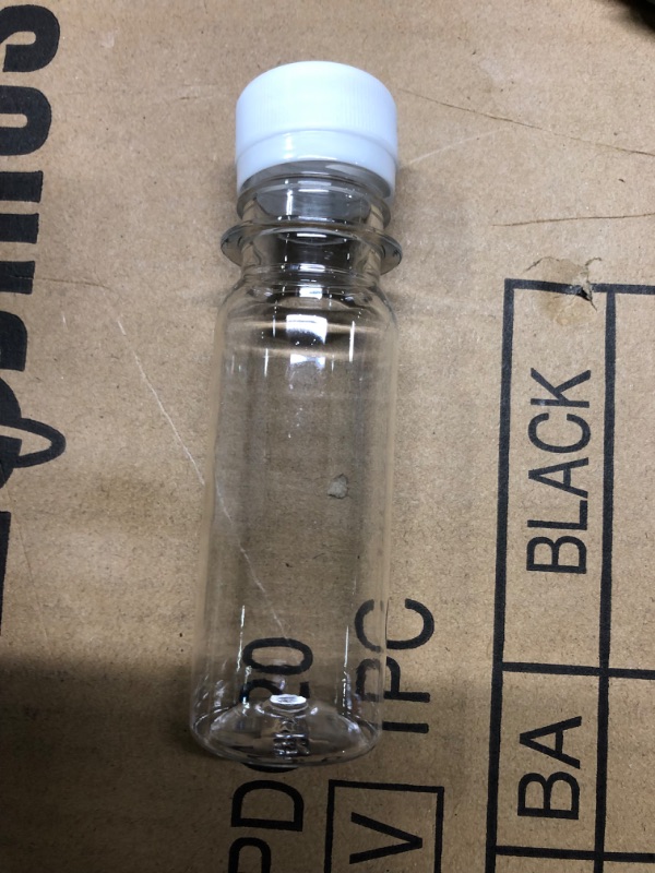 Photo 1 of 2 Oz Small Plastic Bottles for Liquids - Ginger Shot Bottles with Caps, Wellness Juice Shot - Freezer Safe, Leak Proof, Food Grade 2 Oz Bottles - 10 Pack 2 Oz/10 Pack