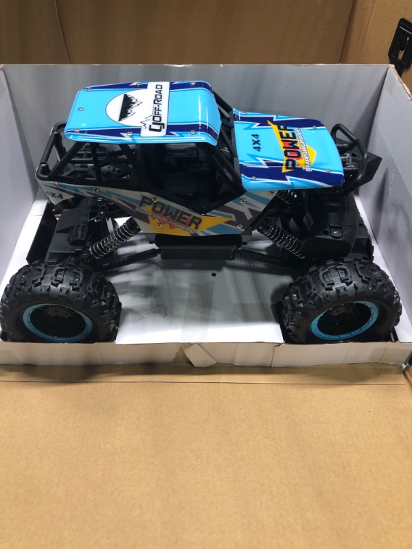 Photo 1 of DOUBLE E RC Car 1:12 Remote Control Car Monster Trucks 4WD Off Road RC Truck with Head Lights All Terrain Electric Vehicles Multicolored