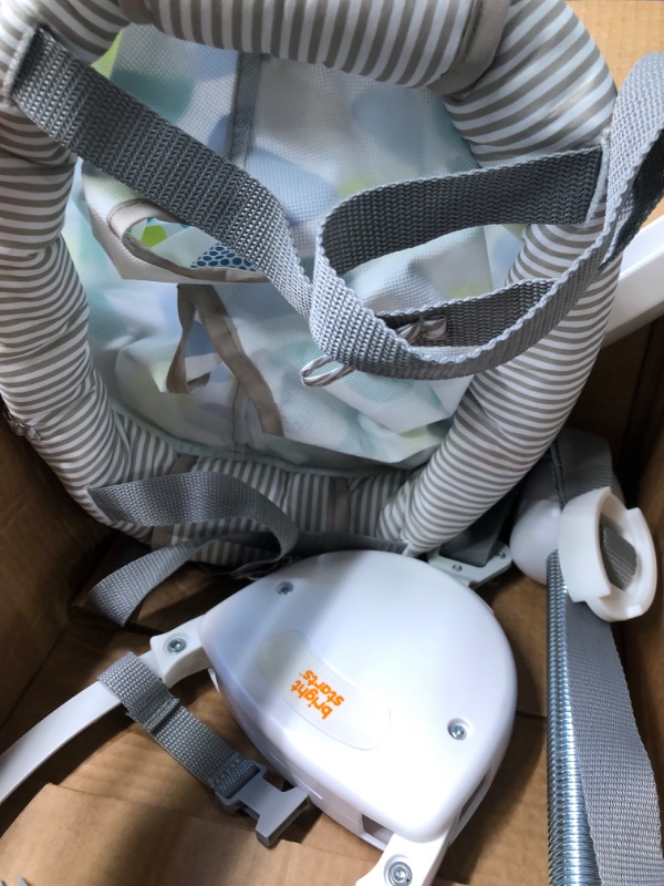 Photo 1 of Bright Starts Playful Parade Door Jumper for Baby with Adjustable Strap, 6 Months and Up, Max Weight 26 lbs

