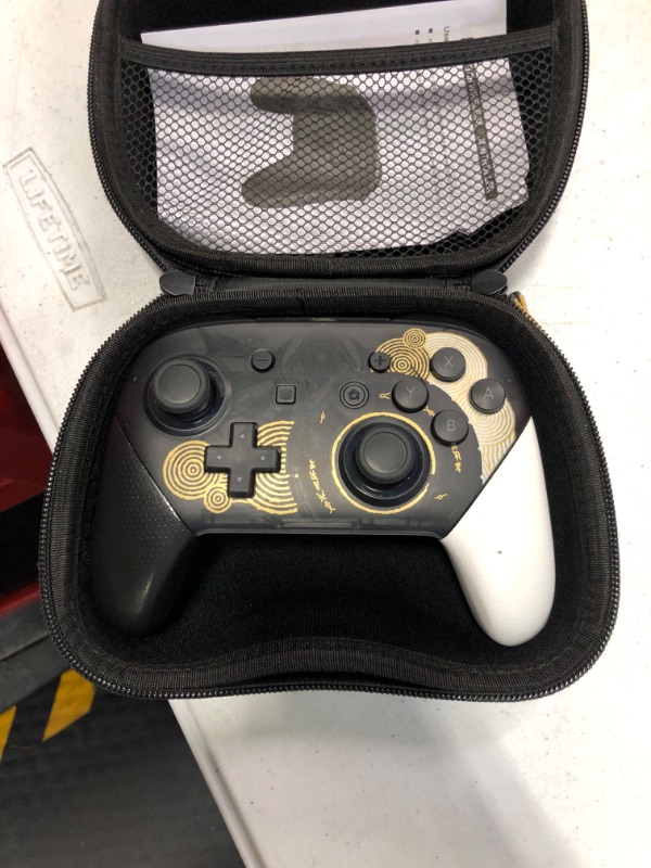 Photo 1 of Switch Pro Controller, Wireless Switch Controllers with Carrying Storage Case, Upgraded Gamepad Switch Remote Replacement for Switch Controller Support NFC/Dual Vibration/Screenshot/Wake-up Function Black and White