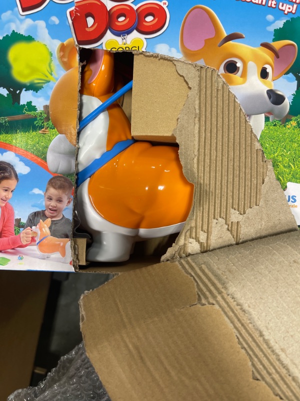 Photo 3 of **MISSING PIECES** 
Doggie Doo Corgi Game - Unpredictable Action - Feed The Doggie and Collect His Doo to Win - Includes 24-Piece Puzzle by Goliath
