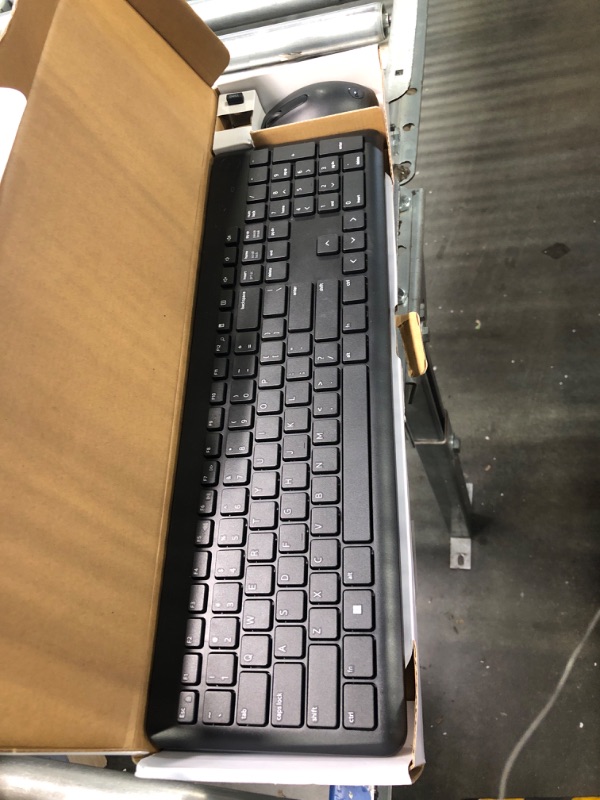 Photo 1 of Dell Wireless Keyboard and Mouse - KM3322W, Wireless - 2.4GHz, Optical LED Sensor, Mechanical Scroll, Anti-Fade Plunger Keys, 6 Multimedia Keys, Tilt Leg - Black