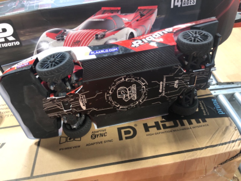 Photo 5 of AMORIL 1:10 Fast Brushless RC Cars,Top Speed 120KM/H Large Remote Control Cars with 6 Lights for Adults,4x4 On-Road Hobby Racing Vechile with Aluminum Shaft, Li-po Battery, Rubber Tire,Oil Shocks,Red
