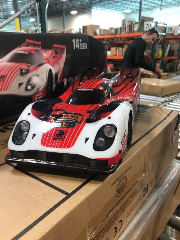 Photo 4 of AMORIL 1:10 Fast Brushless RC Cars,Top Speed 120KM/H Large Remote Control Cars with 6 Lights for Adults,4x4 On-Road Hobby Racing Vechile with Aluminum Shaft, Li-po Battery, Rubber Tire,Oil Shocks,Red
