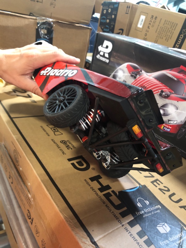 Photo 6 of AMORIL 1:10 Fast Brushless RC Cars,Top Speed 120KM/H Large Remote Control Cars with 6 Lights for Adults,4x4 On-Road Hobby Racing Vechile with Aluminum Shaft, Li-po Battery, Rubber Tire,Oil Shocks,Red
