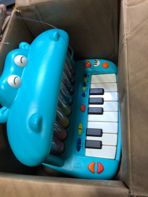 Photo 1 of B. toys- Hippo Pop- Musical Toy Keyboard – Play Piano – Songs, Sounds & Lights – Musical Instrument for Toddlers, Kids – 12 Months +