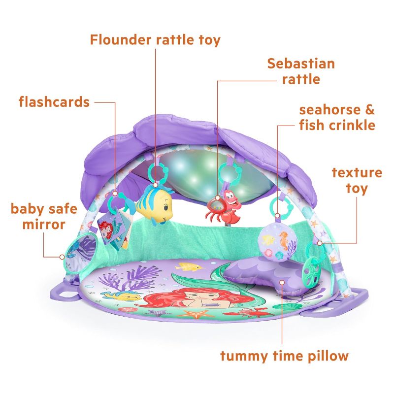 Photo 1 of Bright Starts Disney Baby The Little Mermaid Twinkle Trove Light-Up Musical Baby Activity Gym with Tummy Time Pillow, Newborn+