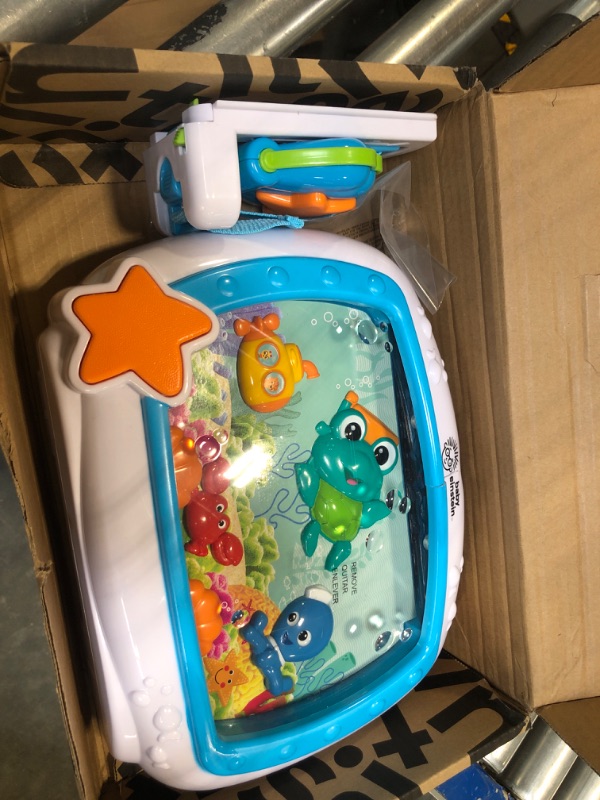 Photo 1 of Baby Einstein Sea Dreams Soother Musical Crib Toy and Sound Machine, Newborns Plus