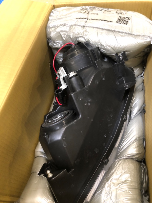 Photo 1 of Dorman 1591153 Driver Side Headlight Assembly Compatible with Select Nissan Models