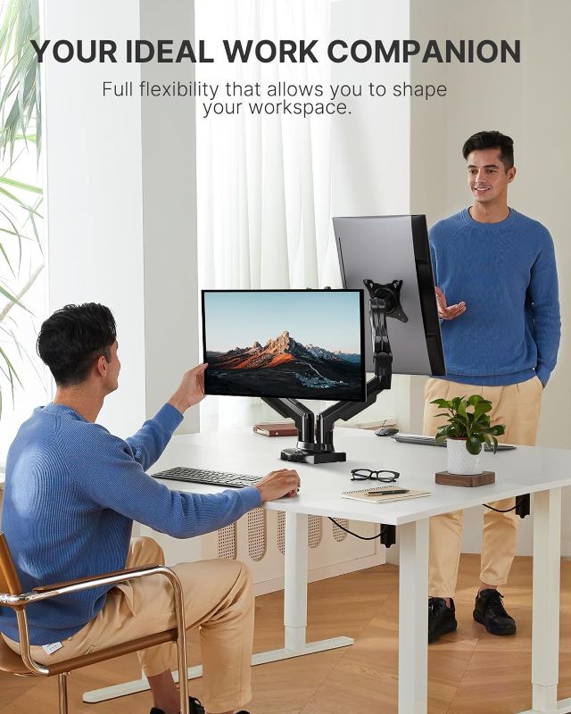 Photo 2 of HUANUO Dual Monitor Stand - Adjustable Spring Monitor Desk Mount Swivel Vesa Bracket with C Clamp,