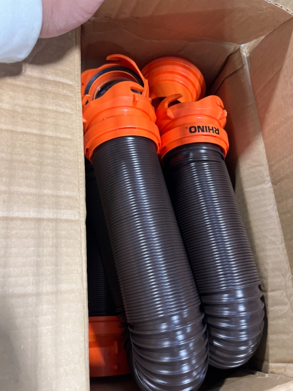 Photo 1 of Camco 20' (39742) RhinoFLEX 20-Foot RV Sewer Hose Kit, Swivel Transparent Elbow with 4-in-1 Dump Station Fitting-Storage Caps Included , Black , Brown 20ft Sewer Hose Kit Frustration-Free Packaging