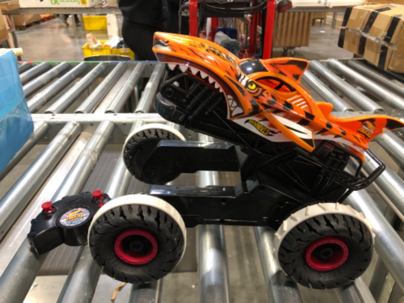 Photo 3 of Hot Wheels RC Monster Trucks Unstoppable Tiger Shark in 1:15 Scale, Remote-Control Toy Truck with Terrain Action Tires