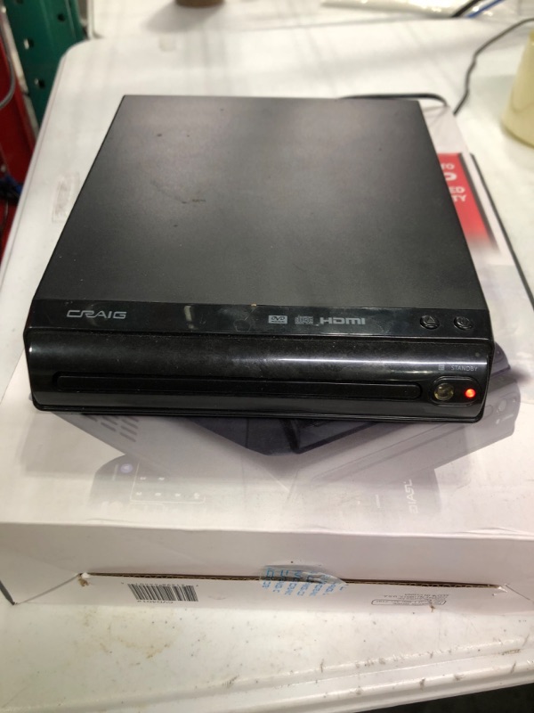 Photo 1 of Craig CVD401A Compact HDMI DVD Player with Remote in Black | Compatible with DVD-R/DVD-RW/JPEG/CD-R/CD-R/CD | Progressive Scan | Up-Convert to 1080p |