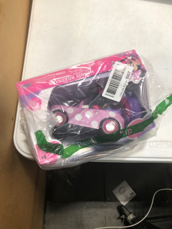 Photo 2 of Disney Junior Minnie Mouse Roadster RC Car with Polka Dots, 27 MHz, Pink with White Polka Dots, Standard (97161)