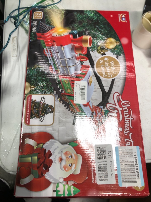 Photo 1 of Christmas Electric Train Set Around The Christmas Tree, Train Toy Set with Track Locomotive Santa Claus Snowman Xmas Tree Music and Lights Christmas New Year Gifts for Boys Girls (Cute Style)