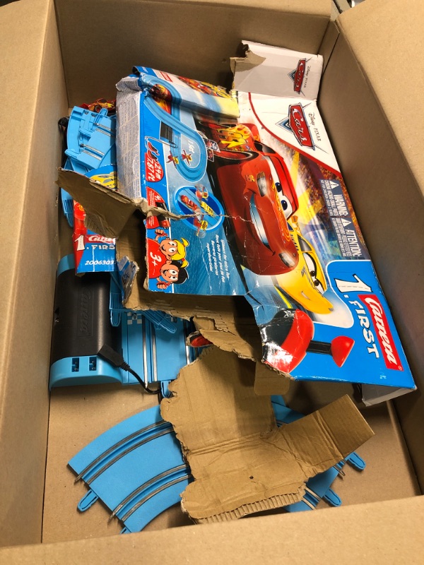 Photo 2 of Carrera First Disney/Pixar Cars - Slot Car Race Track - Includes 2 Cars: Lightning McQueen and Dinoco Cruz - Battery-Powered Beginner Racing Set for Kids Ages 3 Years and Up Disney Cars w/ Spinners