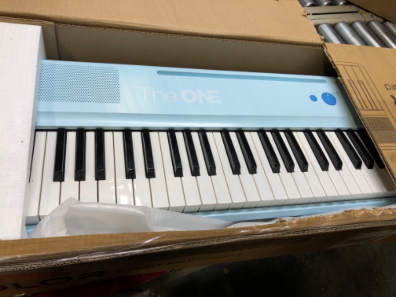 Photo 1 of The ONE Smart Keyboard COLOR 61 Keys Piano Keyboard, Music Keyboard with 256 Timbres, 64 Polyphony, 2 Speakers, Built-in LED Lights and Free Apps (Blue)