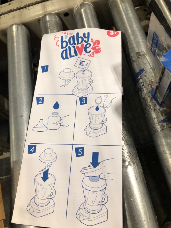 Photo 1 of Baby Alive Magical Mixer Baby Doll Blueberry Blast with Blender Accessories, Drinks, Wets, Eats, Black Hair Toy for Kids Ages 3 and Up