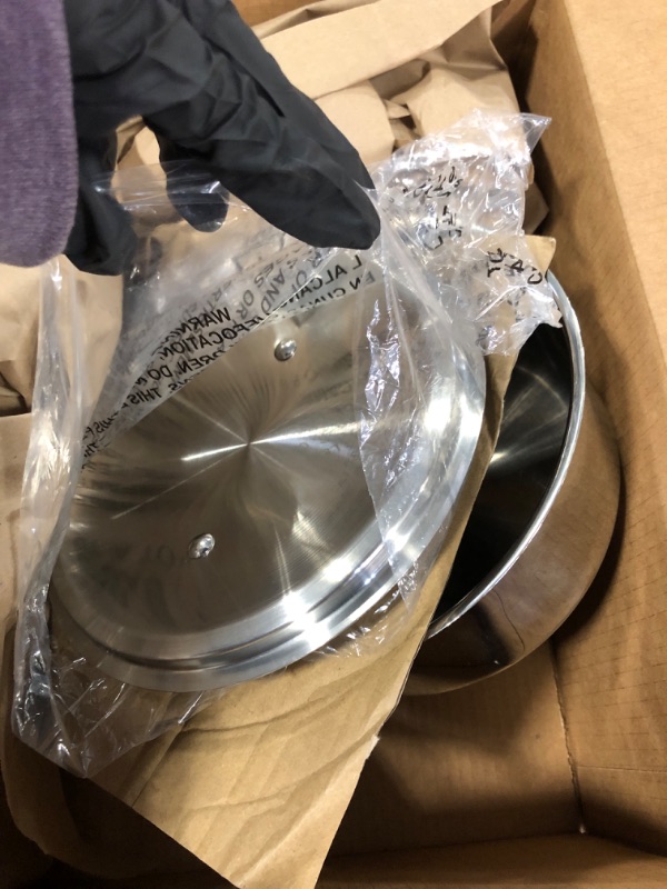 Photo 4 of ** water damage**
Cuisinart Stainless 3-Quart Saucepan and Stainless 2-Quart Saucepan Bundle