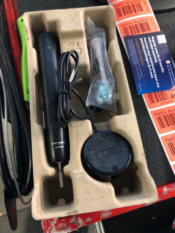 Photo 1 of ** faulty charger**
Philips Sonicare 4100 Power Toothbrush, Rechargeable Electric Toothbrush with Pressure Sensor, Black HX3681/24 Black New 4100