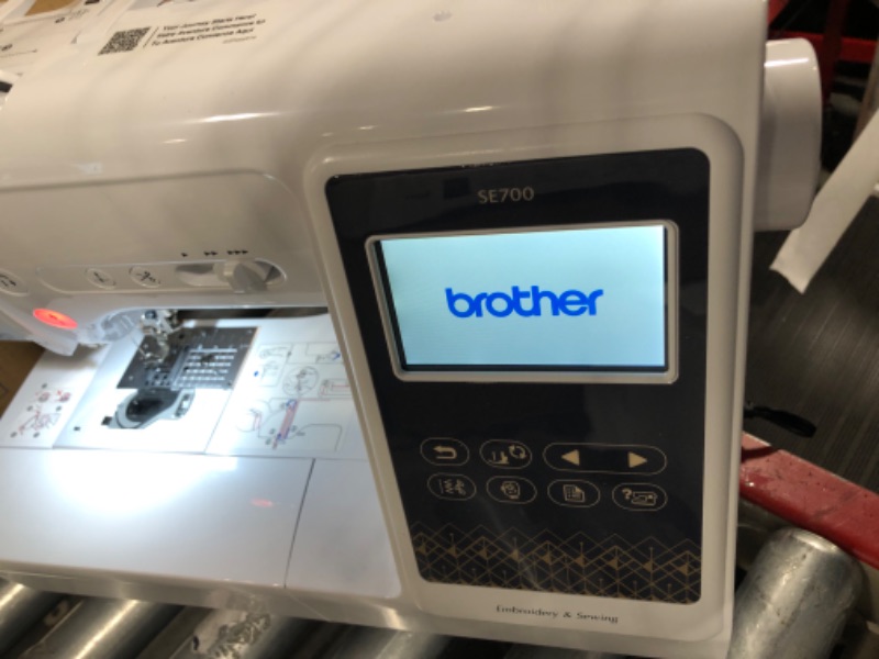 Photo 7 of ** new open box**
Brother SE700 Sewing and Embroidery Machine, Wireless LAN Connected, 135 Built-in Designs, 103 Built-in Stitches, Computerized, 4" x 4" Hoop Area, 3.7" Touchscreen Display, 8 Included Feet
