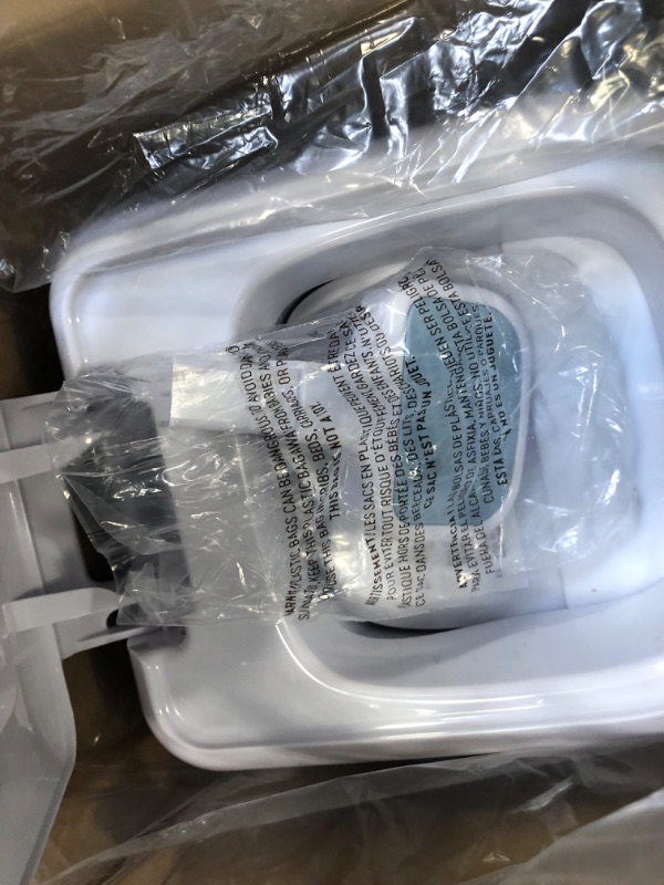 Photo 1 of Diaper Genie Platinum Pail (Glacial Blue) is Made in Durable Stainless Steel and Includes 1 Easy Roll Refill with 18 Bags That can Last up to 5 Months.