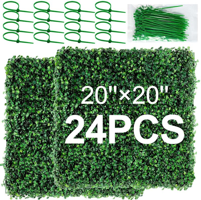 Photo 1 of **USED** ROCEEI 24 Pcs Grass Wall Panels Boxwood Hedge Wall Panels Artificial Grass Wall Backdrop Greenery Wall with 100 Zip Ties UV Protected Privacy Screen for Indoor Outdoor Wall Decor (20'' x 20'')
