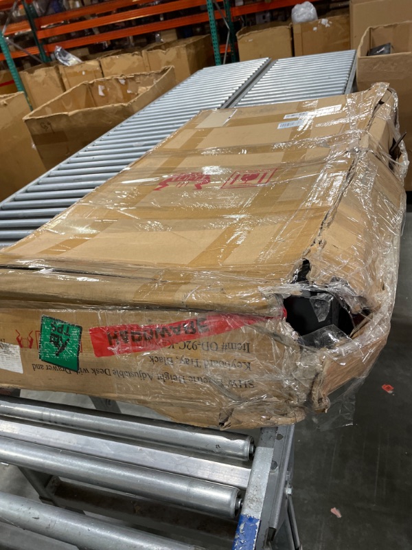 Photo 1 of SHW 48-Inch Electric Height Adjustable Desk with Keyboard Tray and Two Drawers, Black 48-Inch w/ Keyboard Tray & 2 Drawers Black