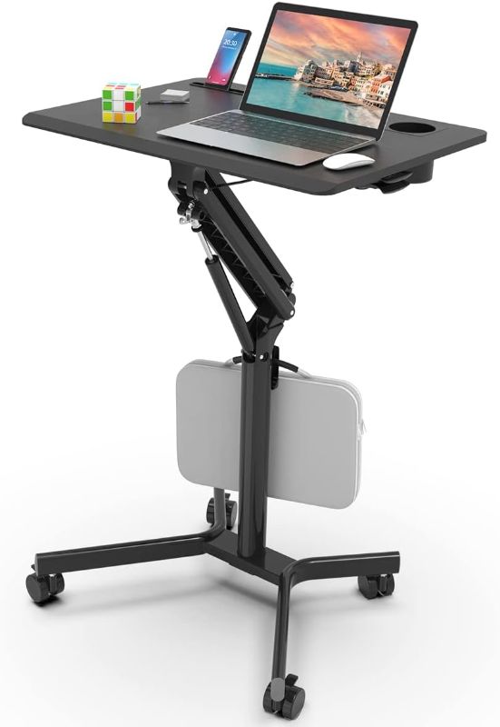 Photo 1 of JOY worker Mobile Standing Desk, 28 inch Small Height Adjustable Rolling Laptop Desk, Portable Sit Stand Desk with Lockable Wheels, Ergonomic Desktop Table for Home Office, Black