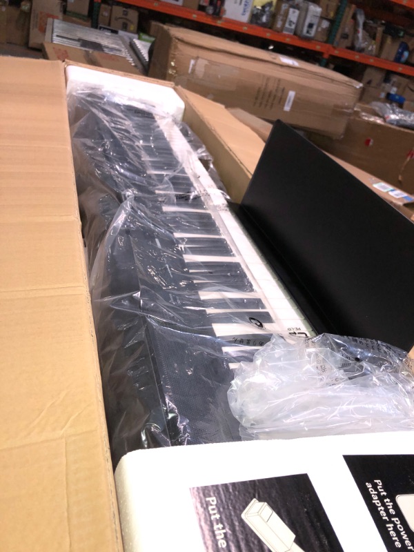 Photo 1 of **FOR PARTS**Donner DEP-10 Beginner Digital Piano, 88 Key Full-Size Semi-Weighted Keyboard, Portable Electric Piano with Sustain Pedal, Power Supply