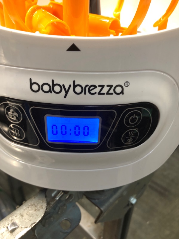 Photo 4 of Baby Brezza Baby Bottle Sterilizer and Dryer  Machine – Electric Steam Sterilization - Universal Fit - Pacifiers, Glass, Plastic, and Newborn Feeding Bottles ***USED MISSING PARTS**** CAN BE USED FOR PARTS*** 