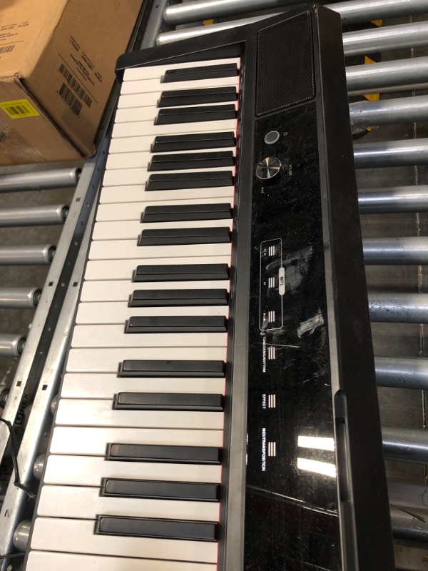 Photo 2 of Eastar EP-120 88-Key Weighted Keyboard Piano with Touch-sensitive screen, Portable Digital Piano with Sustain Pedal, Power Supply for Beginner
