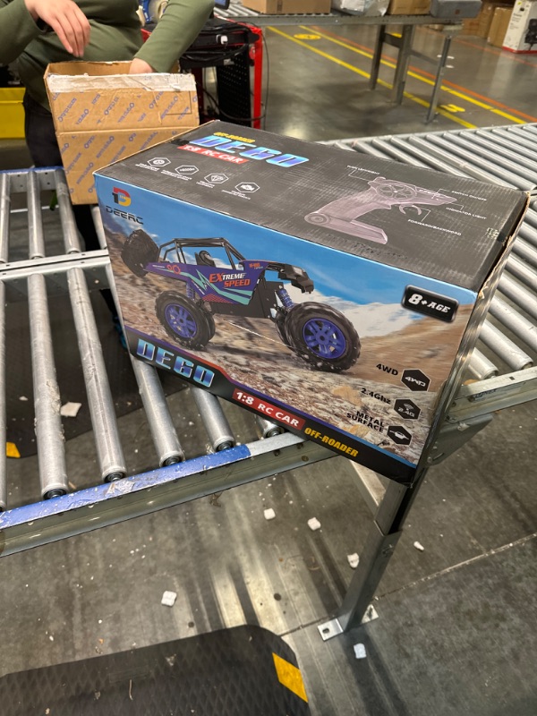 Photo 2 of DEERC DE60 Large 1:8 Scale Upgraded RC Cars Remote Control Car for  Boys,Off Road Monster Truck with Realistic Sound,2.4Ghz 4WD Rock Crawler Toy All Terrain Climbing,2 Batteries for 80 Min Play Classic Blue