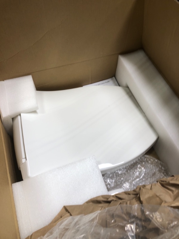 Photo 3 of ** FOR PARTS** KOHLER K-5724-0 Puretide Bidet Toliet Seat, Elongated Manual Non Electric Bidet with Adjusting Spray Pressure and Position, White Quiet-Close Lid White Elongated Toilet Seat