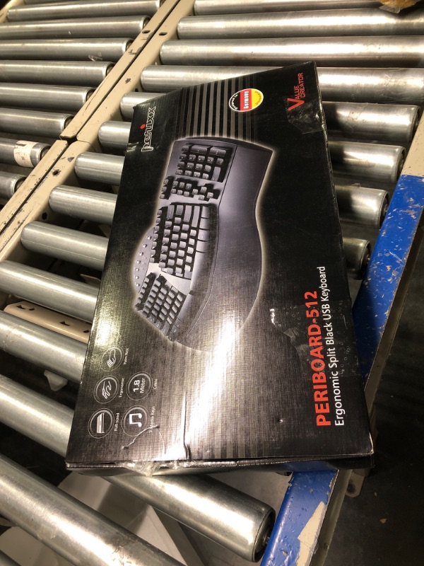 Photo 1 of Perixx Periboard-512 Ergonomic Split Keyboard - Natural Ergonomic Design - Black - Bulky Size 19.09"x9.29"x1.73", US English Layout Wired Black Keyboard