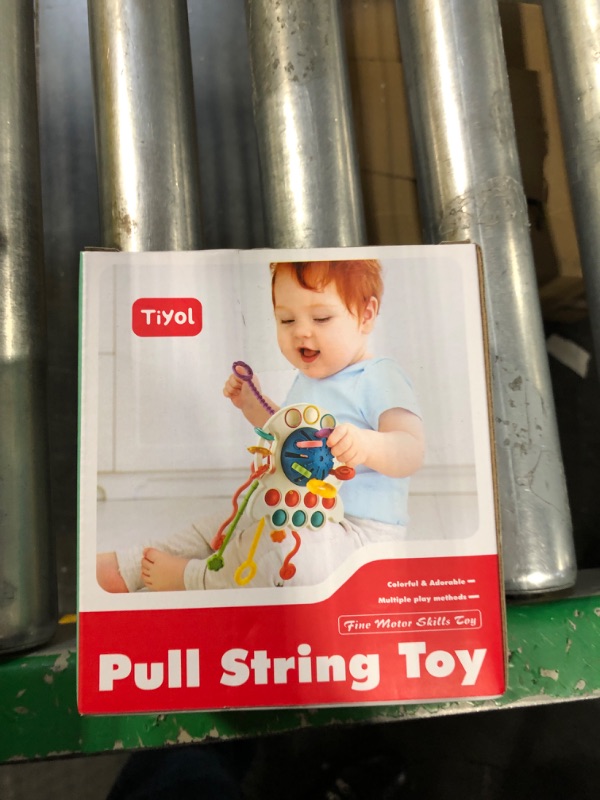 Photo 2 of **USED AND SMALL** Tiyol Montessori Toys for 1+ Year Old, Food Grade Silicone Pull String Activitys, Developmental Pulling Teething Baby Sensory Toy, Fun Car Seat Airplane Travel Toddler Boy &Girl Infant Birthday Gifts