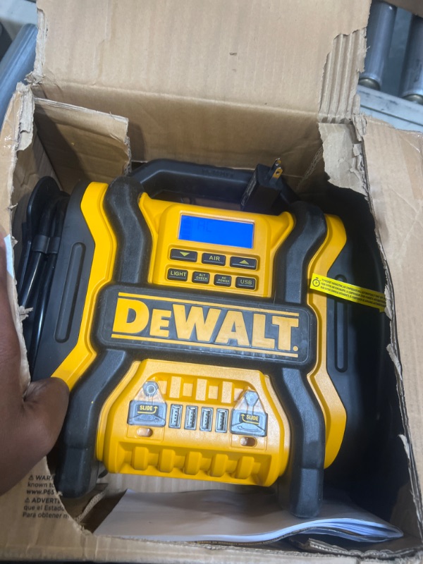 Photo 1 of DEWALT DXAEPS14 1600 Peak Battery Amp 12V Automotive Jump Starter/Power Station with 500 Watt AC Power Inverter, 120 PSI Digital Compressor, and USB Power , Yellow