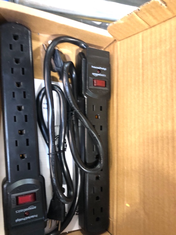 Photo 3 of Amazon Basics 6-Outlet, 200 Joule Surge Protector Power Strip, 2 Foot, Black - Pack of 2 Black Strip