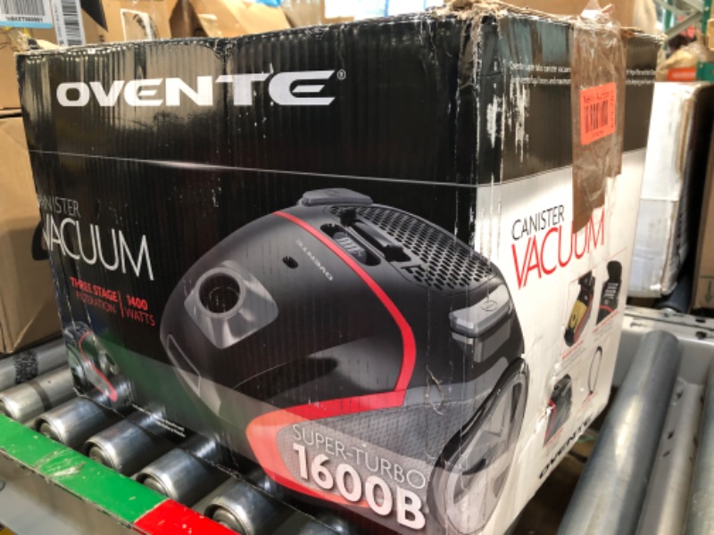 Photo 2 of **USED FOR PARTS** OVENTE Electric Lightweight Canister Vacuum Cleaner with 3 Cleaning Tools for Hard Floor Carpet, Easy Clean & Storage, Bonus of Pack of 4 Dust Bags and 1 Filter, Black ST1600B + ACPST16041 Black Canister Vacuum + 4 dust bag and 1 Filter