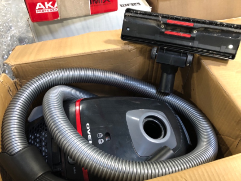 Photo 3 of **USED FOR PARTS** OVENTE Electric Lightweight Canister Vacuum Cleaner with 3 Cleaning Tools for Hard Floor Carpet, Easy Clean & Storage, Bonus of Pack of 4 Dust Bags and 1 Filter, Black ST1600B + ACPST16041 Black Canister Vacuum + 4 dust bag and 1 Filter