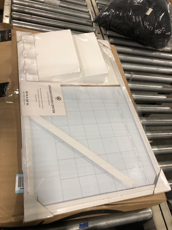 Photo 3 of U Brands Organization Center Dry Erase Calendar with White Frame, Office Supplies, with Hooks and Mail Sorter 18” x 30”
***Middle divider is broken, but can be glued/adhered back*** 