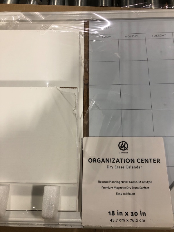 Photo 4 of U Brands Organization Center Dry Erase Calendar with White Frame, Office Supplies, with Hooks and Mail Sorter 18” x 30”
***Middle divider is broken, but can be glued/adhered back*** 