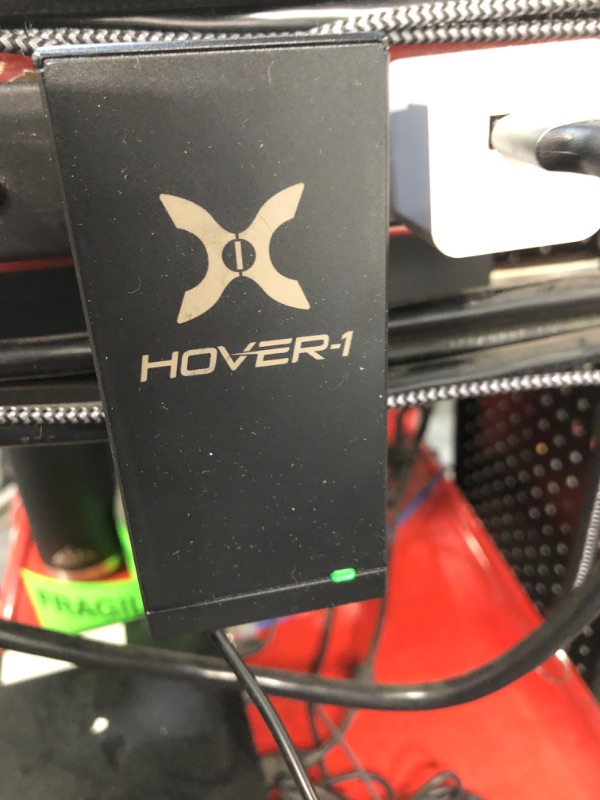 Photo 1 of Hover-1 Superfly Electric Hoverboard, 7MPH Top Speed, 6 Mile Range, Long Lasting Li-Ion Battery, 5HR Full Charge, Built-In Bluetooth Speaker, Rider Modes: Beginner to Expert, Black
***Charger is functional, but could not power on due to no charge*** 