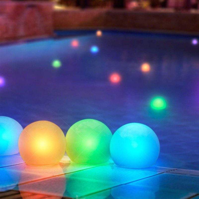 Photo 1 of  Floating Lights for Pool (Set of 12) 3” Round Light Up Pool Glow Balls  Pool Decorations LED Lighted Balls for Pool
***Stock photo shows a similar item, not exact*** 