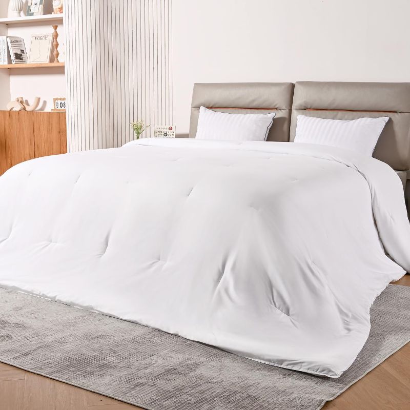 Photo 1 of **LARGE ** USED** Alaskan King Bedding Comforter, Extra Large Lightweight Down Alternative Comforter for All Season, Breathable Soft Hollow Microfiber Comforter Duvet Insert, 8 Corner Tabs, White 120"x132"